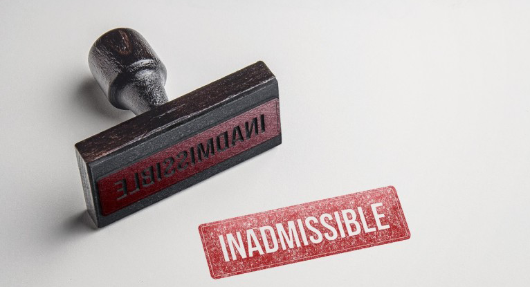 Inadmissible stamp on a white surface